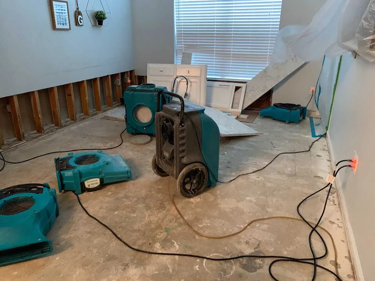 Dehumidifier in flood-cut room for Water Damage Restoration in Holmen